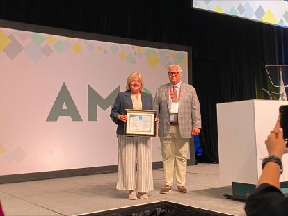 Ombudsman presenting Good Governance Award to Hamilton Mayor Andrea Horwath