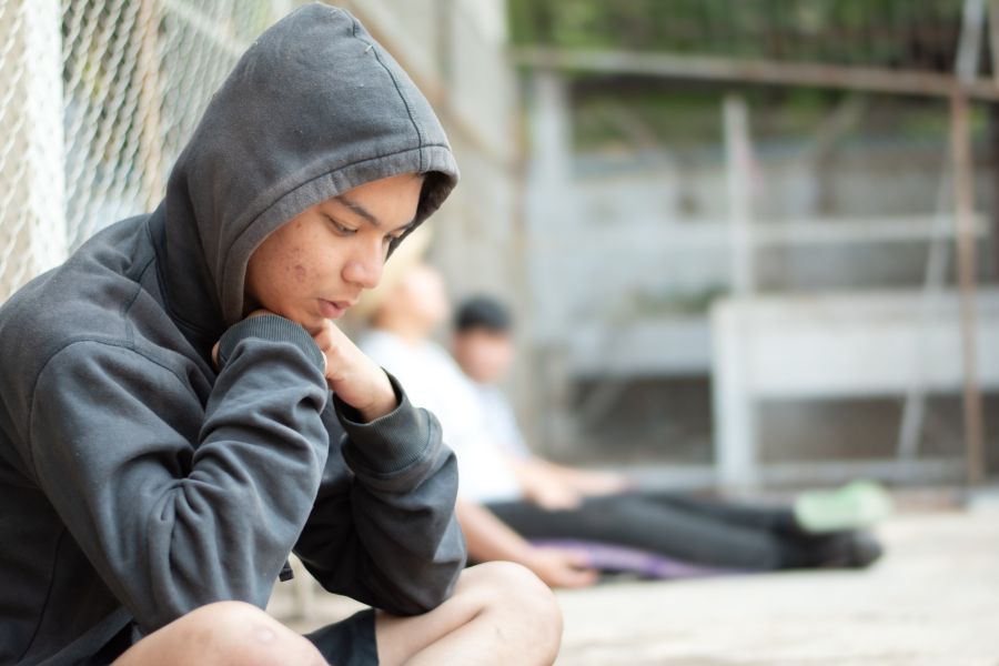 Young person with hoodie Young person with hoodie